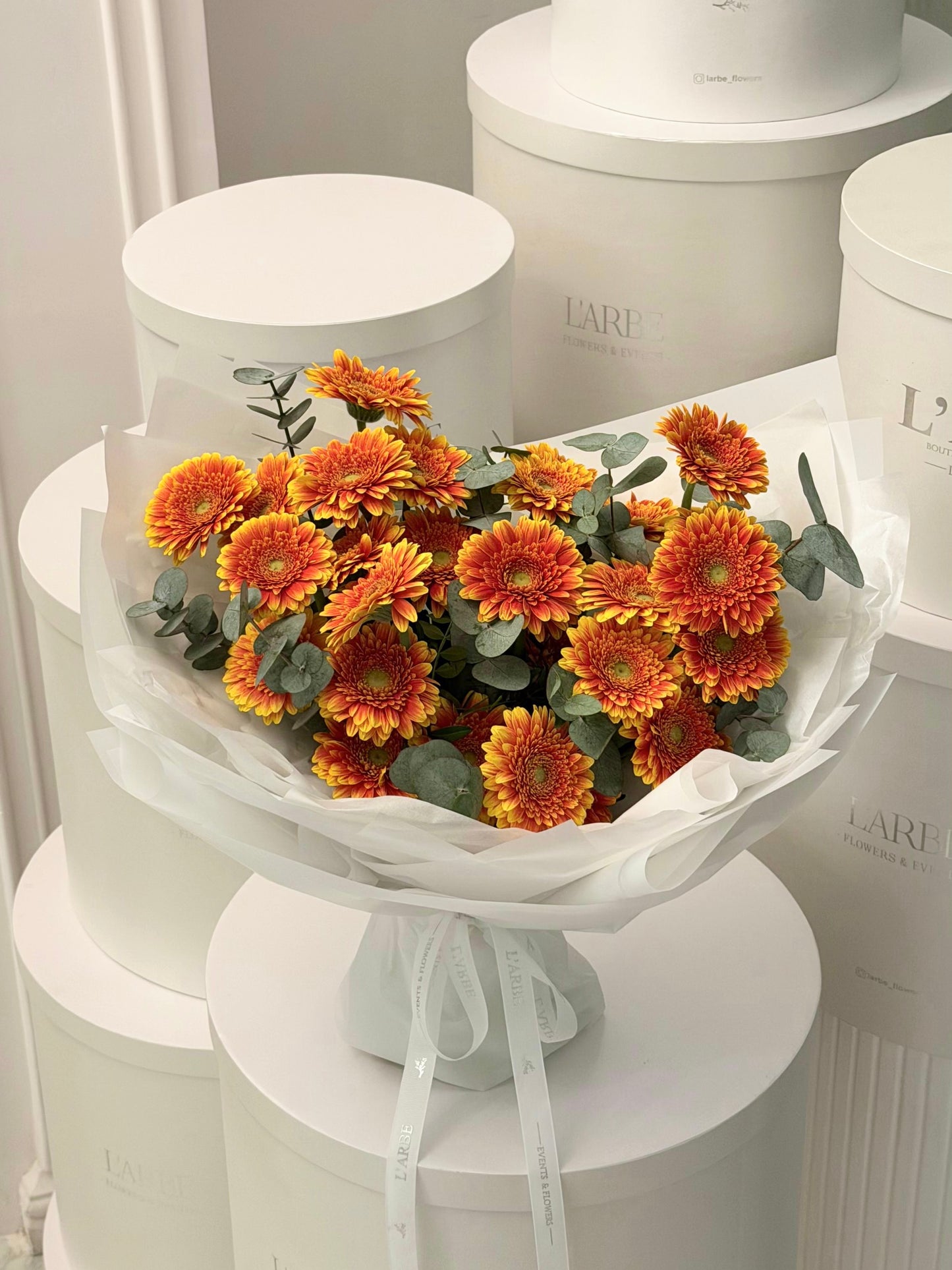 FLOWERS BOUQUET WITH HERBERA AND EUCALYPTUS