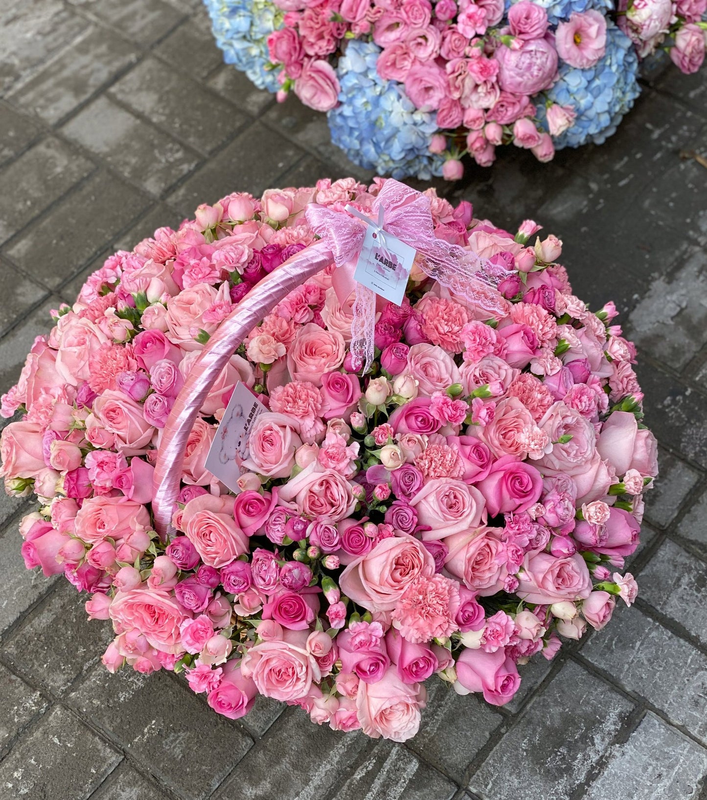 PINK FLOWERS ARRANGEMENT IN BASKET IN BOX WITH ROSES AND DIANTHUS