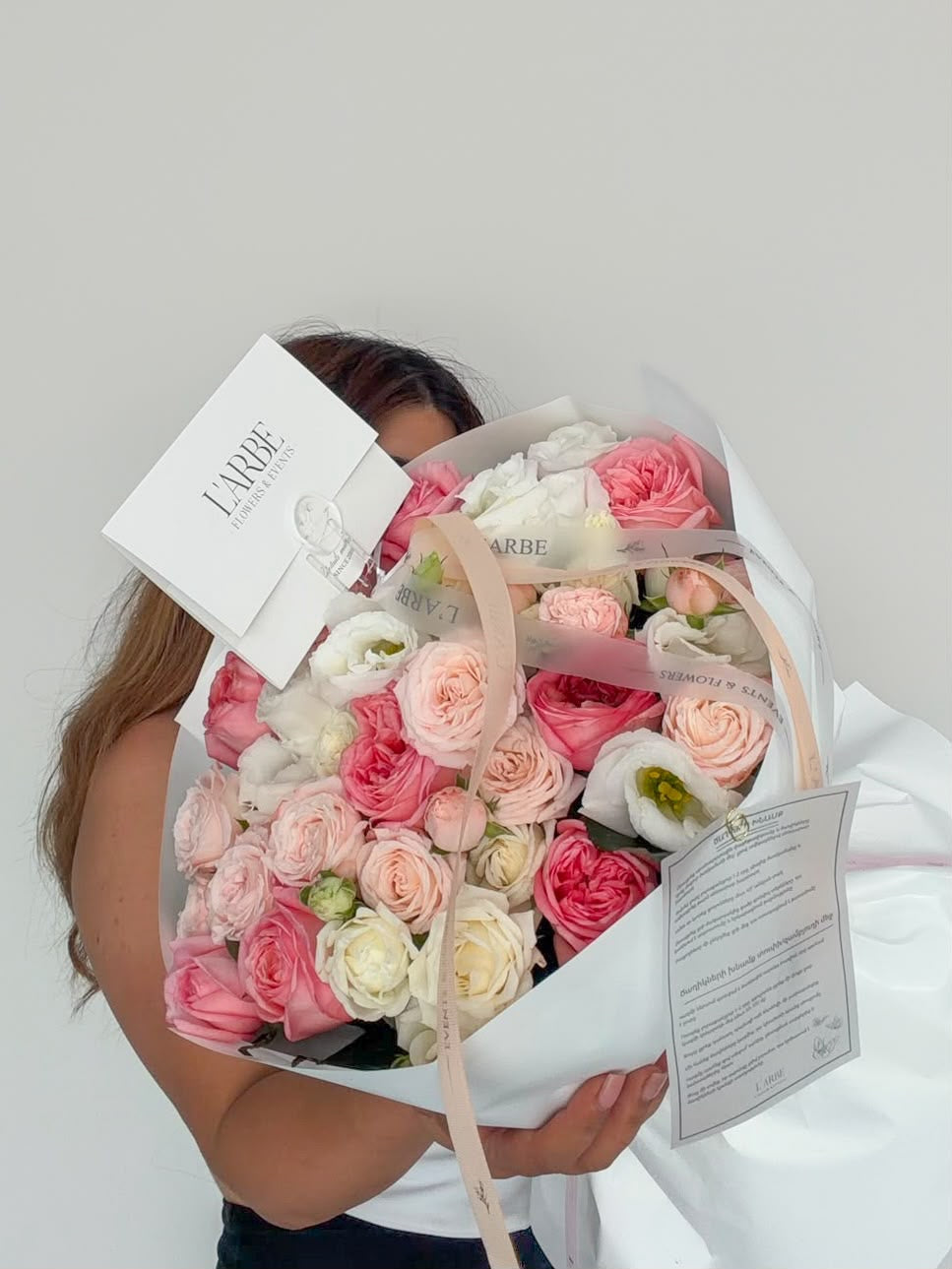 FLOWERS PINK AND WHITE MIX WITH ROSES AND EUSTOMA