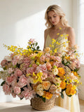 YELLOW AND PINK FLOWERS BASKET WITH ORCHIDS, ROSES, EUSTOMA AND CHAMOMILE