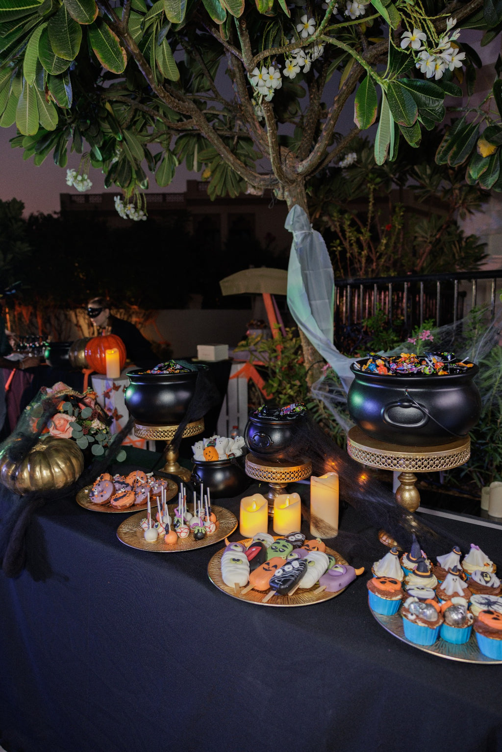 Witch’s Cauldron Luxury Halloween Candy & Dessert Station with Black & Gold Decor