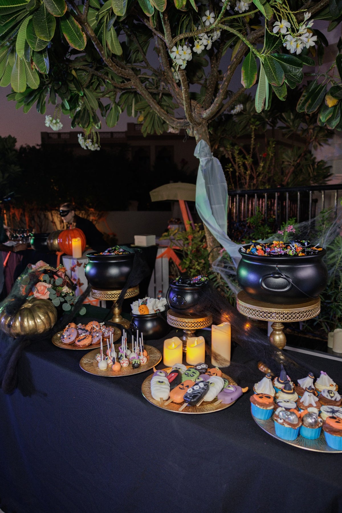 Witch’s Cauldron Luxury Halloween Candy & Dessert Station with Black & Gold Decor