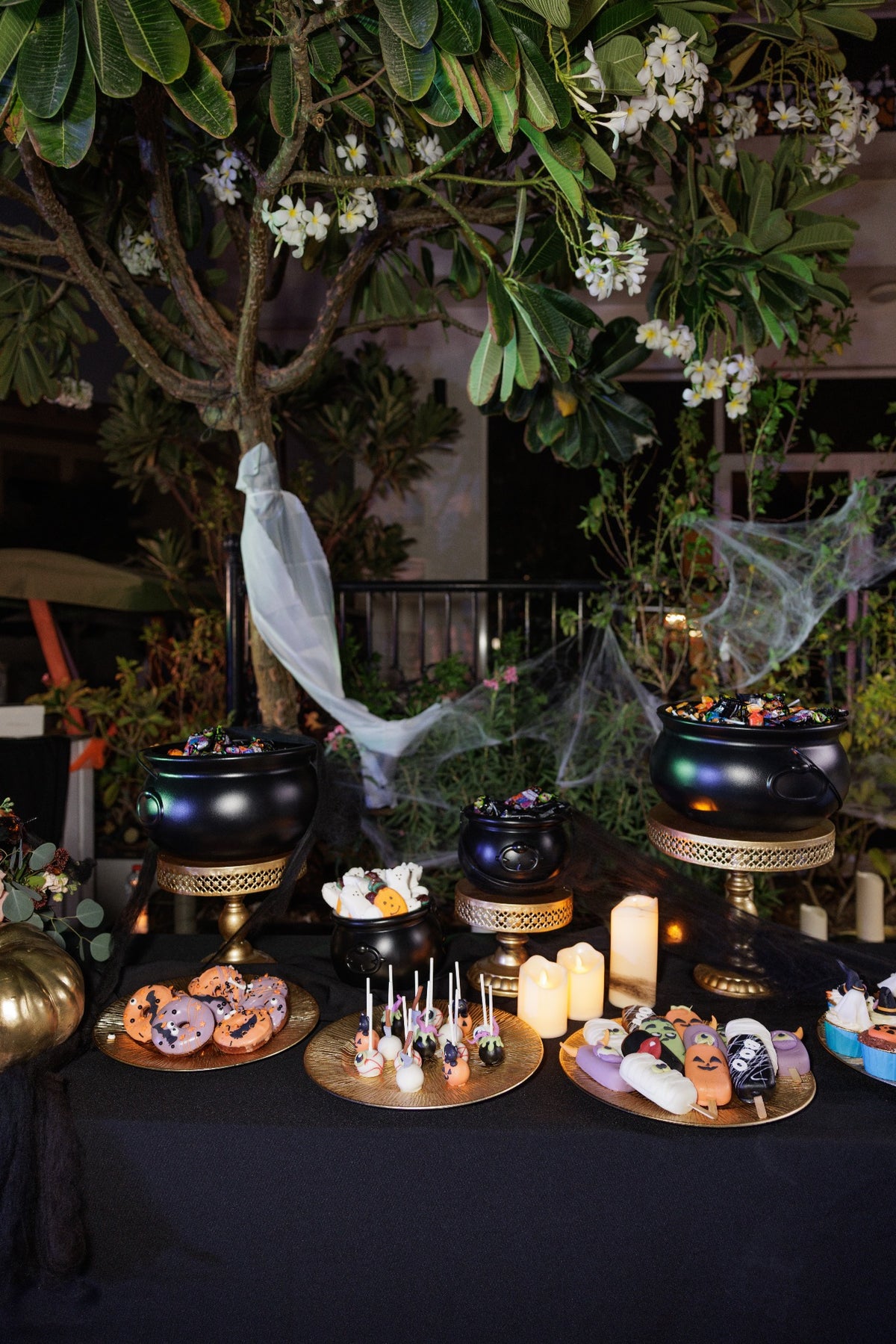 Witch’s Cauldron Luxury Halloween Candy & Dessert Station with Black & Gold Decor