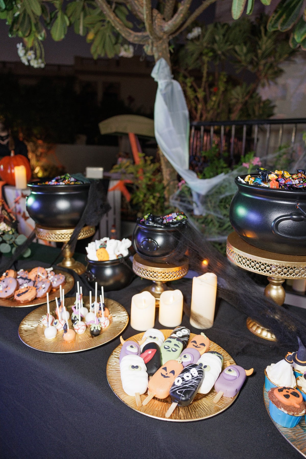 Witch’s Cauldron Luxury Halloween Candy & Dessert Station with Black & Gold Decor