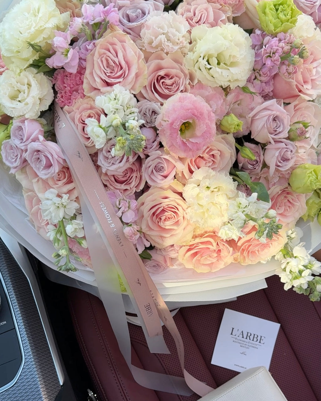 LILAC AND PINK FLOWERS ARRANGEMENT WITH ROSES, MATTHIOLA AND EUSTOMA “DIVINA” 0113
