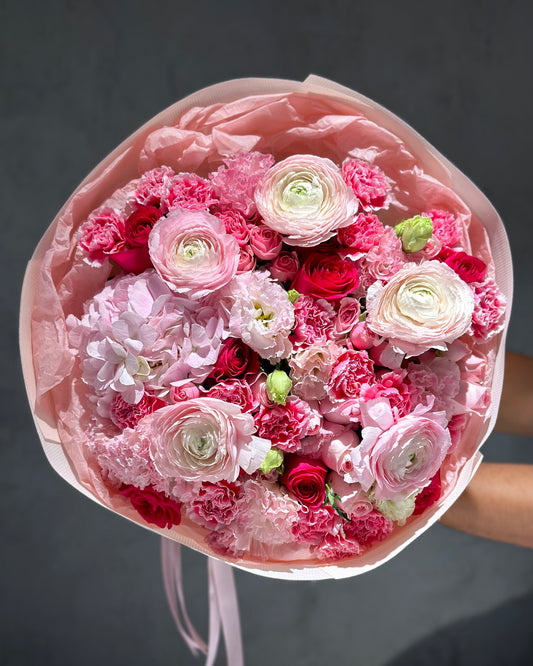 Fresh pink flowers with rananculus “Inferno”