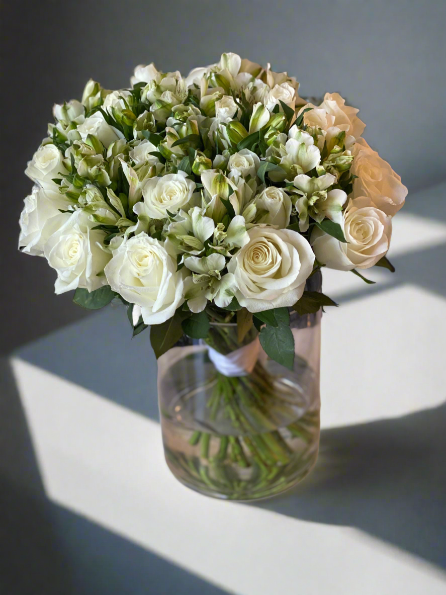 Alstroemerias and roses white