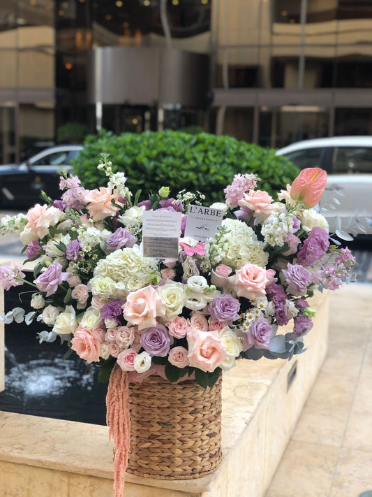 “Viola” mix of flowers bouquet in basket