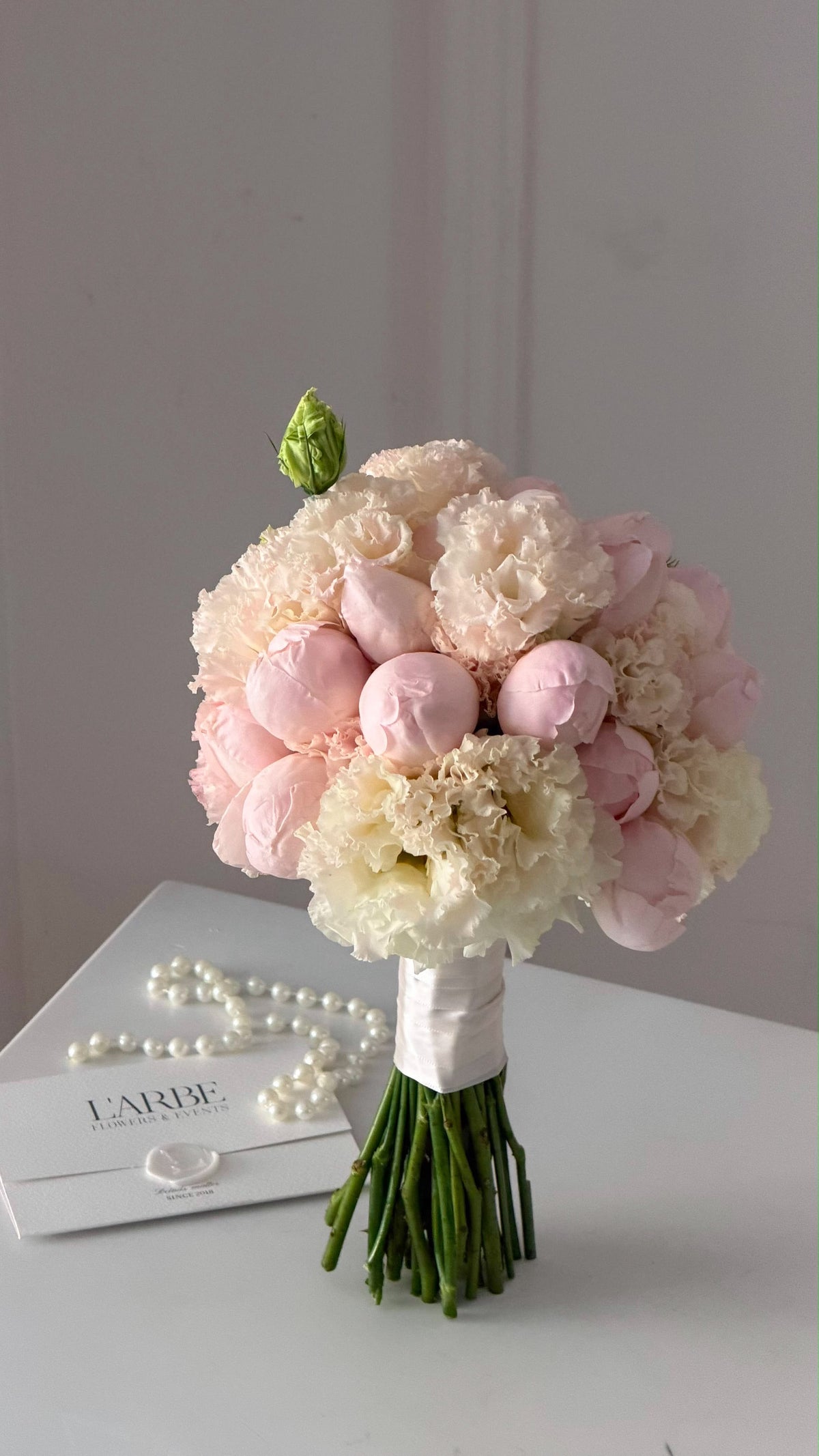 BRIDE BOUQUET WITH EUSTOMA AND PEONY ROSES