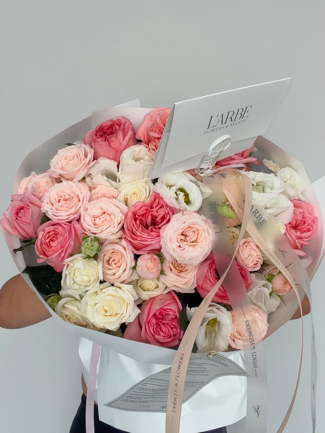 FLOWERS PINK AND WHITE MIX WITH ROSES AND EUSTOMA