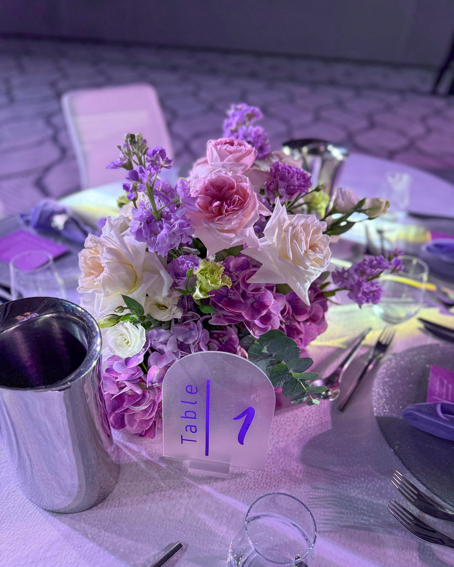 Centerpieces lilac color fresh and artificial flowers