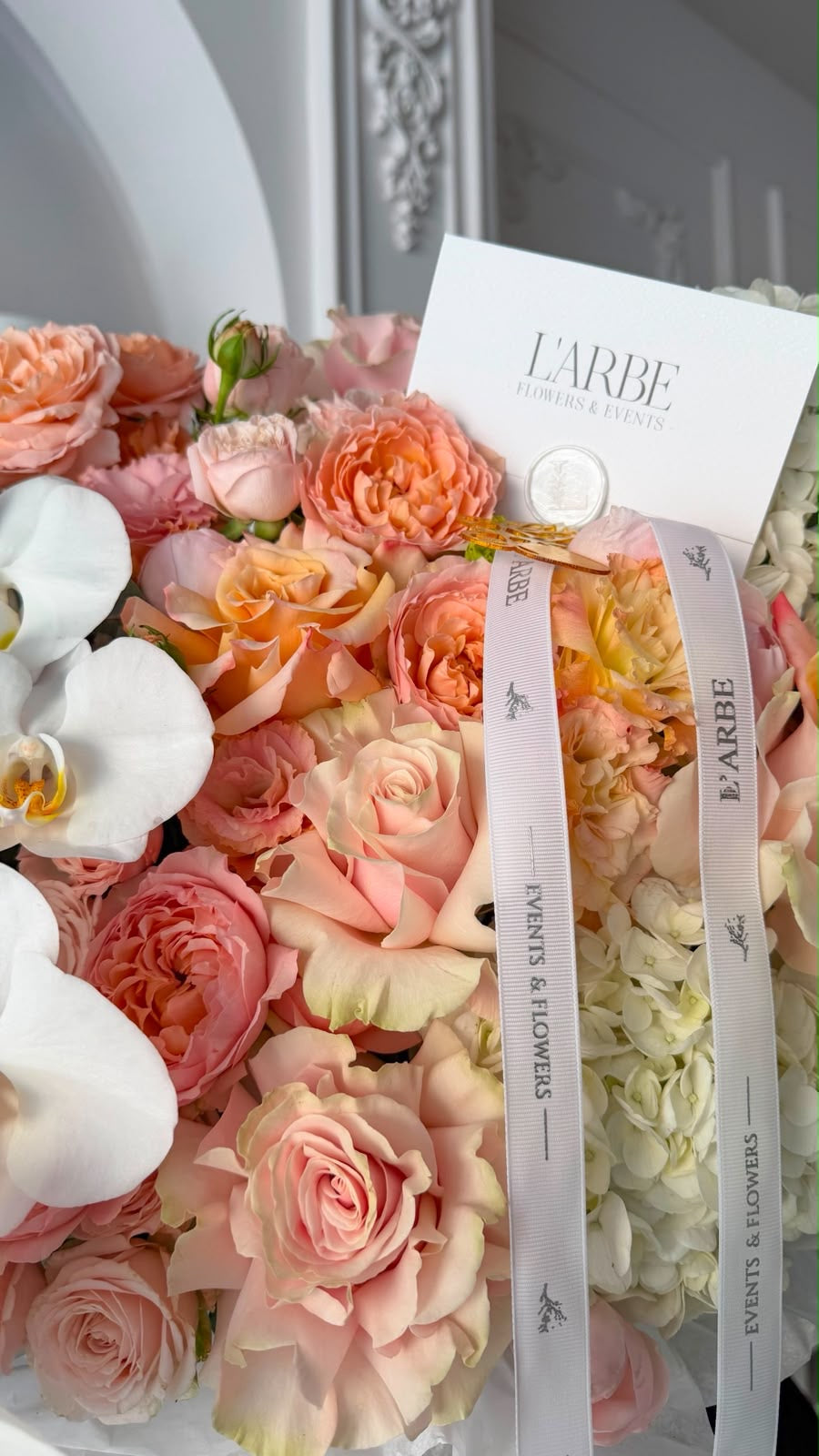 FLOWERS MIX ORANGE AND WHITE WITH ORHID “APEROL NEW BAG”
