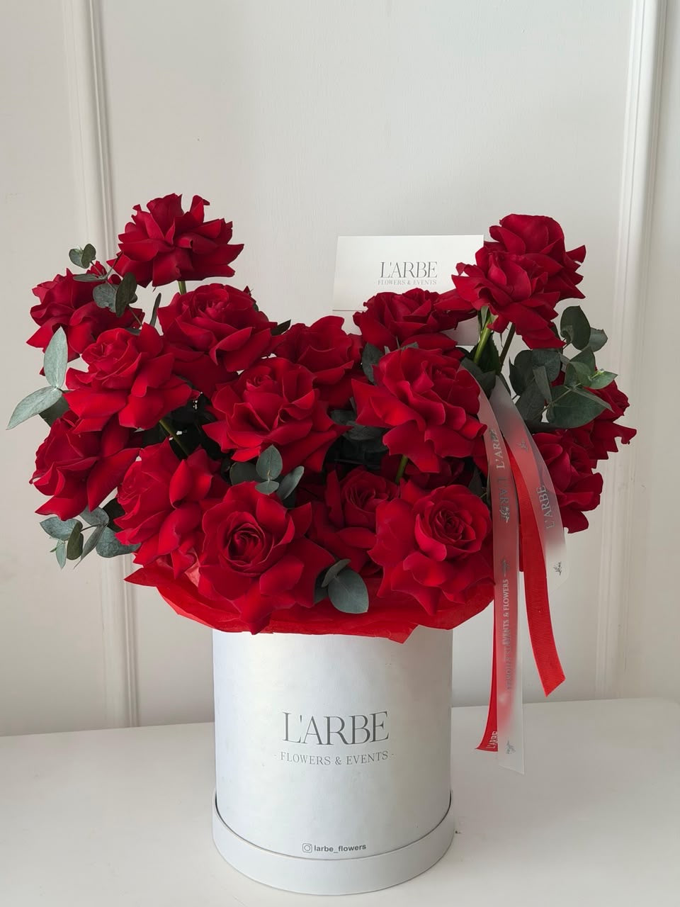 FLOWERS BOX WITH RED ROSES AND EUCALYPTUS