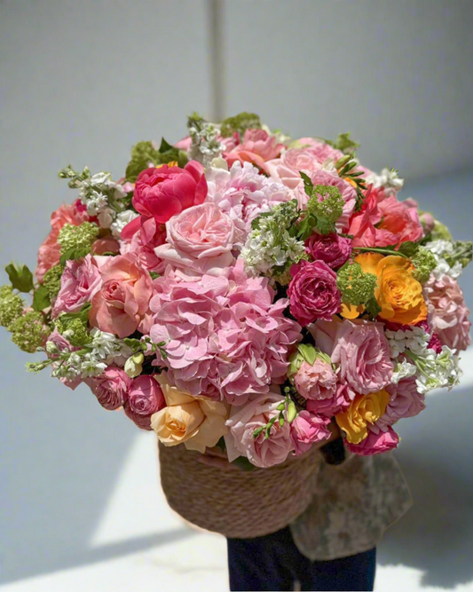 Flowers bouquet in basket “Herschel”