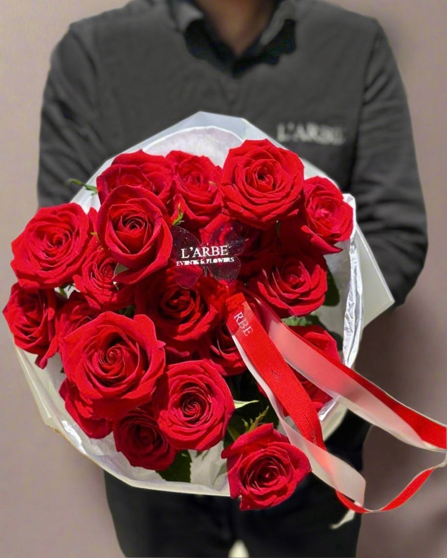 19 red roses in white wrapping (colour can be changed)