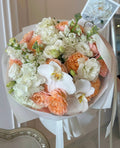 WHITE AND ORANGE FLOWERS BOUQUET WITH ORCHIDS, ROSES AND MATTHIOLA “CROWN” POLY 0121