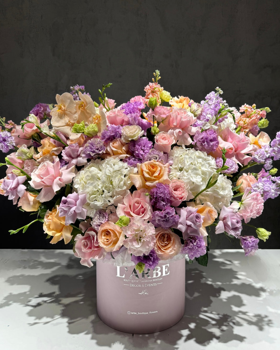 LILAC SHADES FLOWERS BOUQUET IN BOX WITH HYDRANGEA, MATTHIOLA AND FREESIA