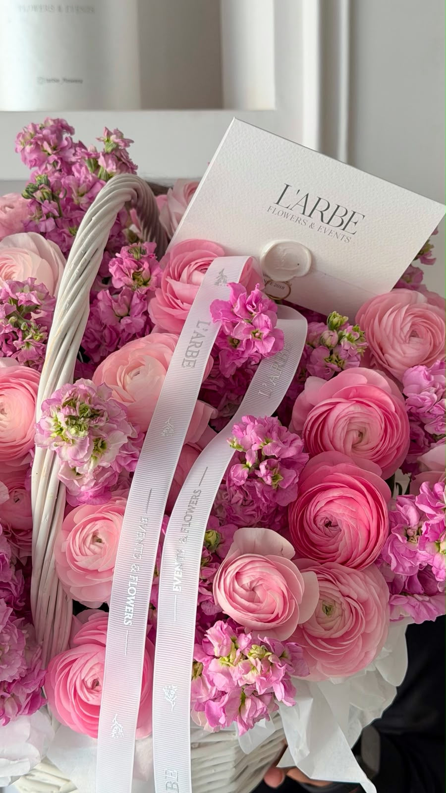FLOWERS BASKET WITH PINK RANUNCULUS AND MATHIOLA