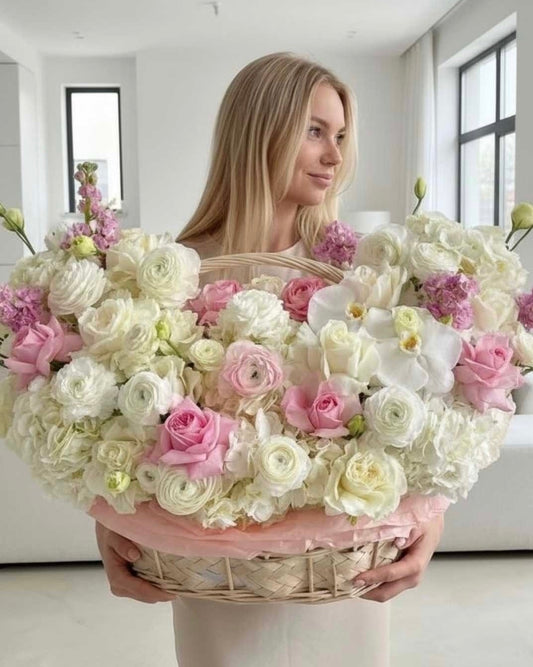 WHITE AND PINK FLOWER BASKET WITH RANUNCULUS, ORCHIDS AND MATTHIOLA