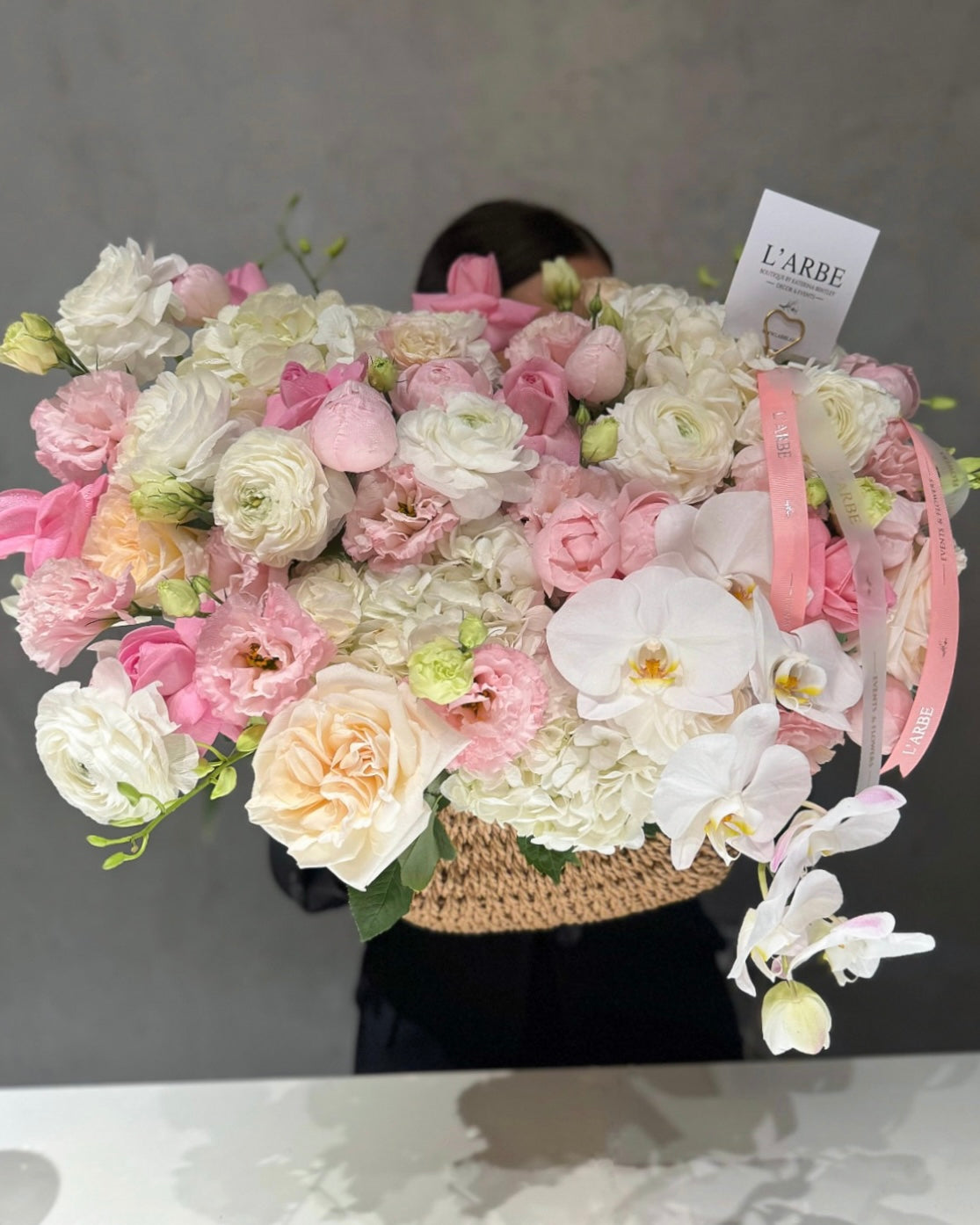 WHITE AND PINK FLOWERS BOUQUET IN BASKET WITH ORCHIDS, ROSES