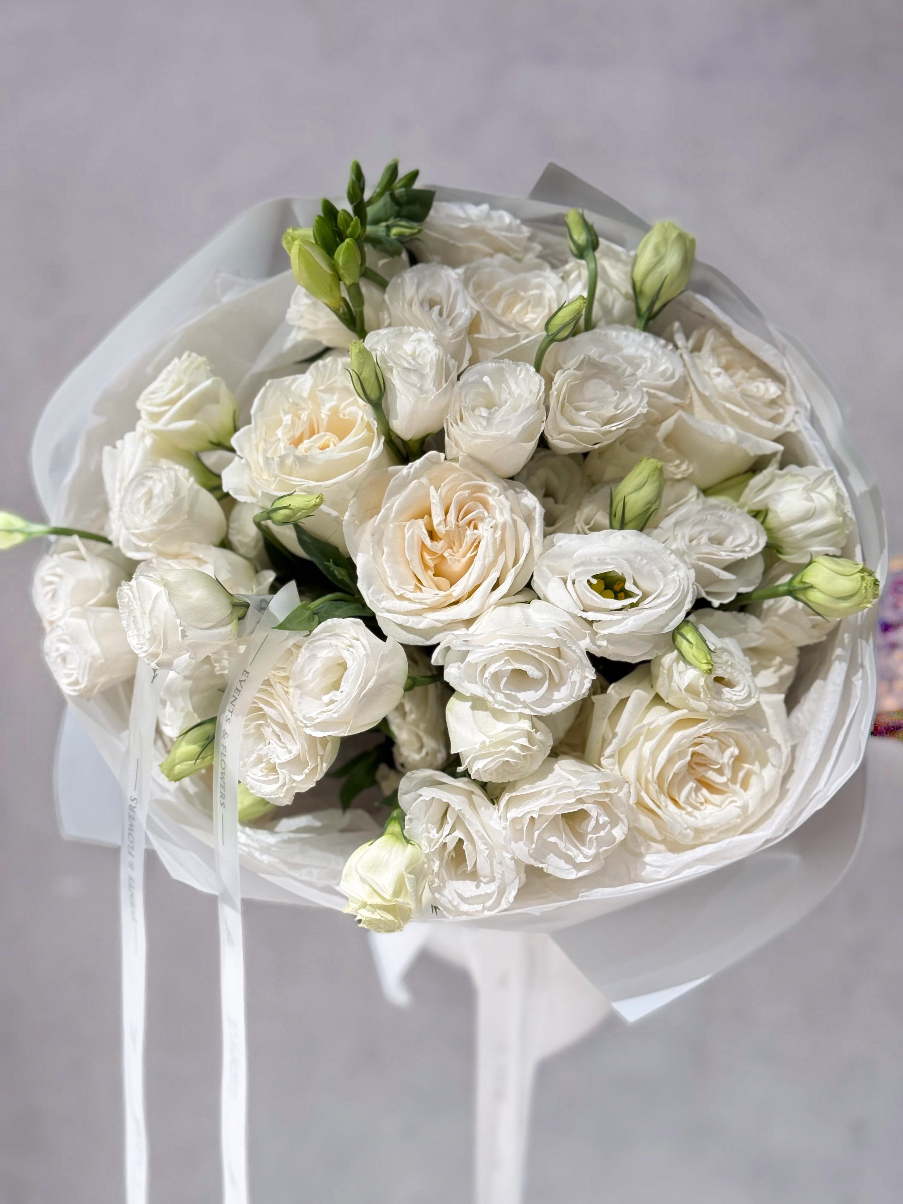 WHITE FLOWERS BOUQUET MIX WITH PEONY ROSES AND EUSTOMA