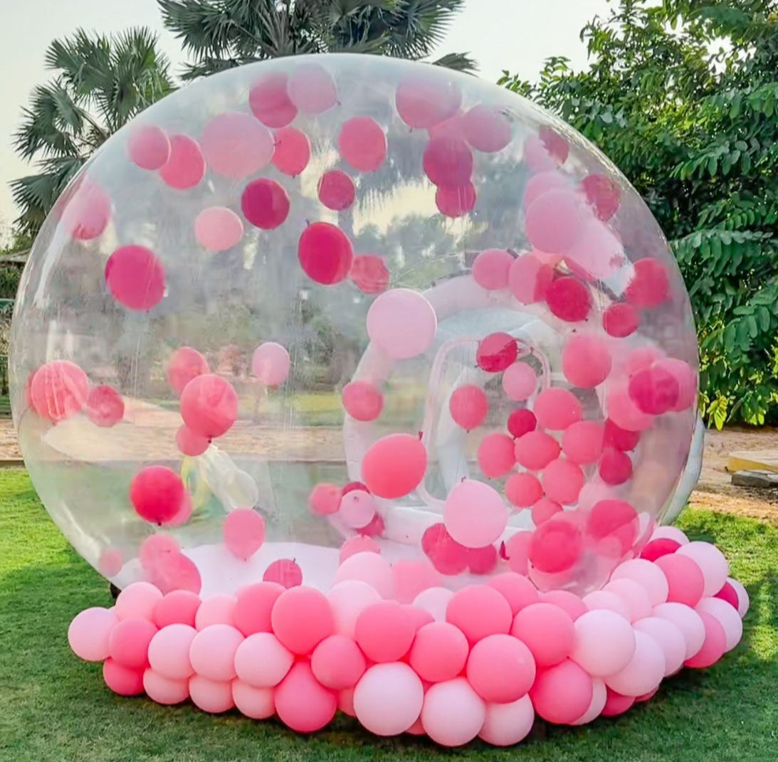 Bubble House for kids with balloon garland on outside rent