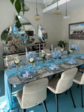 Table setup for 8 adults with flowers, candles - white, silver, blue (rent)