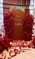 Red backdrop (photo zone) with red flowers (mix artificial and real) - roses, candle holders, candles (rent)