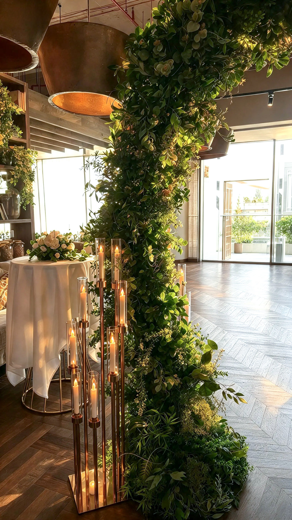 Elegant Green Floral Arch with Lush Greenery & Gold Candle Stands – Rent