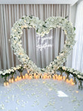 Elegant White Photo Backdrop with Heart-Shaped Floral Arch  – Rent