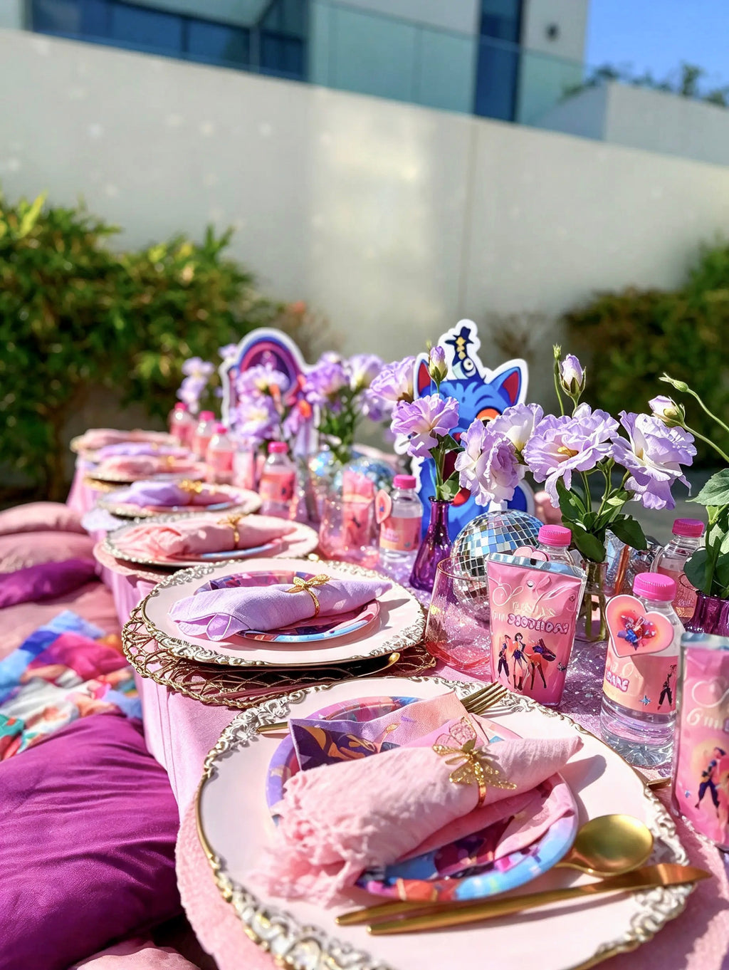KPop Demon Hunters Themed Birthday Table Setting with Pink & Purple Floral Decor, Gold Tableware & Disco Accents (10 kids) – Rent
