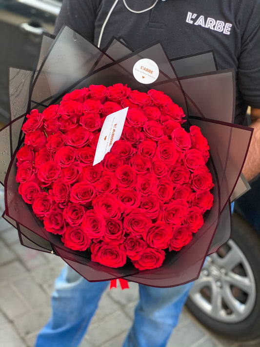 Red roses in black wrapping 🖤