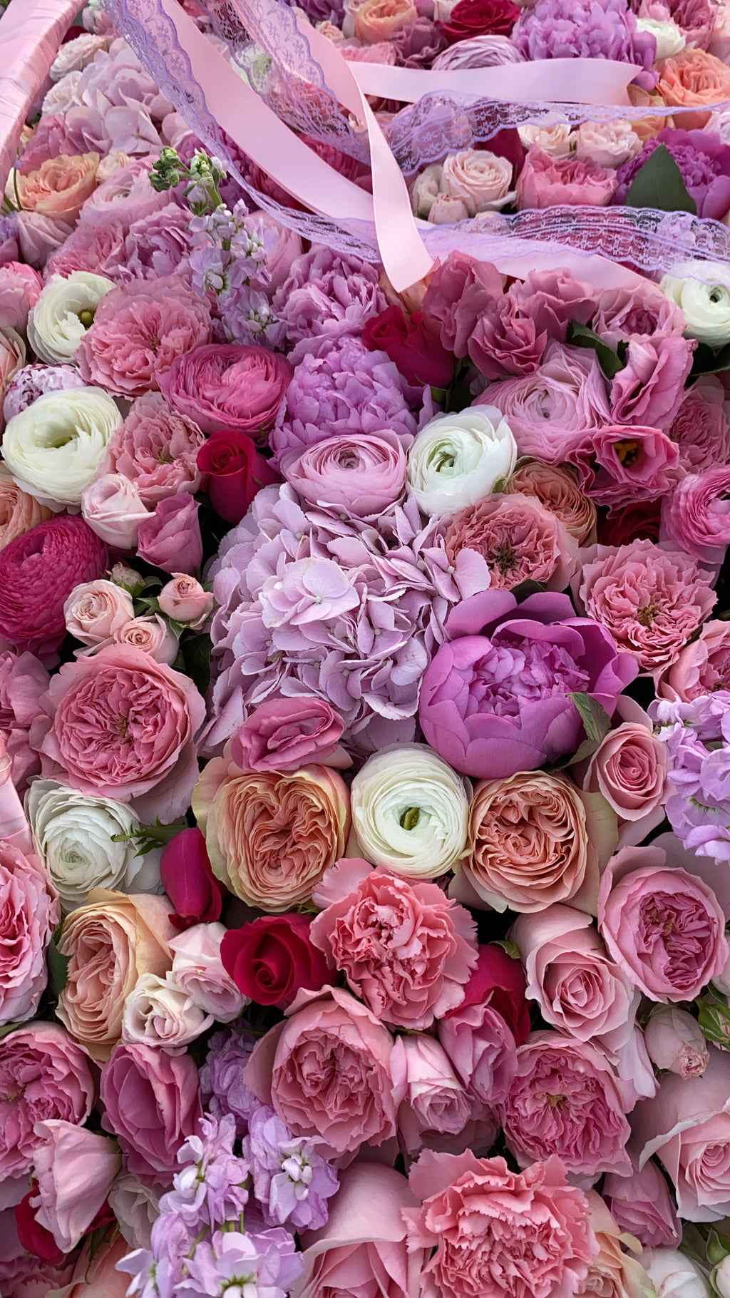 BASKET WITH PEONIES, RANUNCULUS, GARDEN ROSES