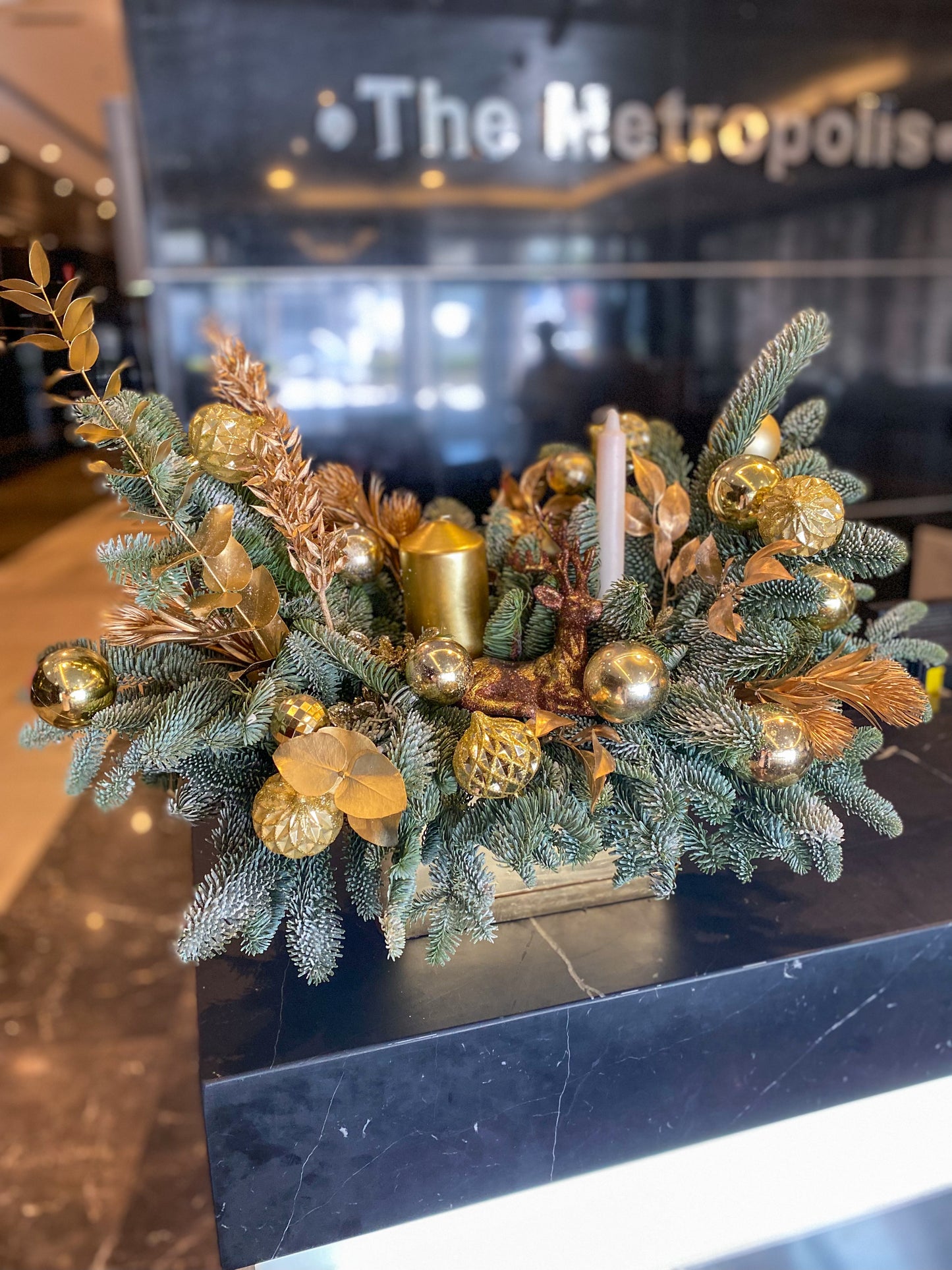 Christmas tree centerpiece in gold (fresh nobilis)