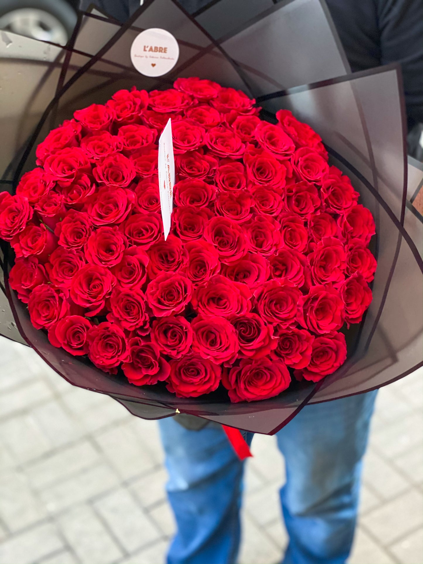 Red roses in black wrapping 🖤