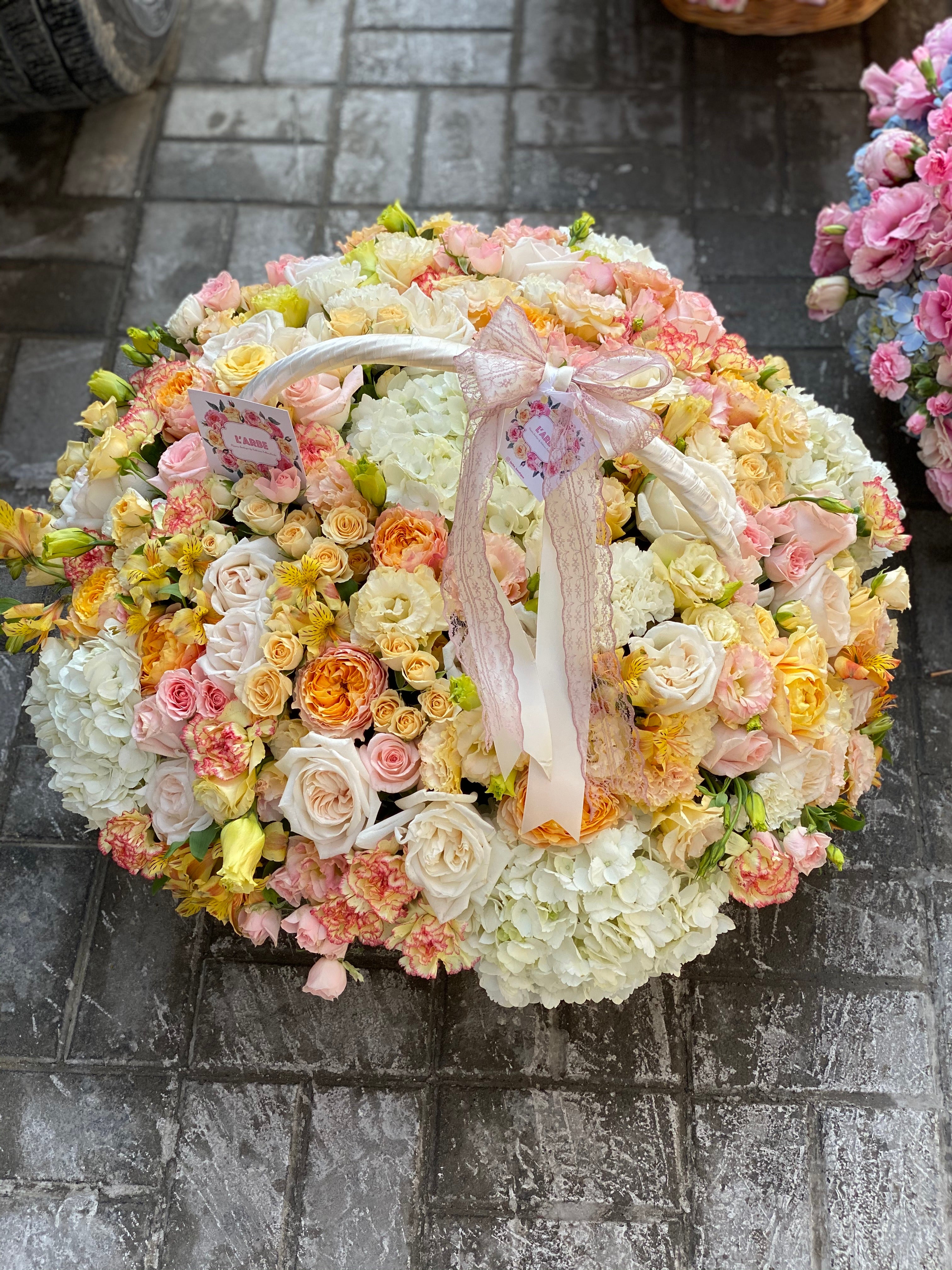 YELLOW PEACH FLOWERS BOUQUET IN BASKET WITH ROSES, HYDRANGEA, DIANTHUS AND ALSTROEMERIA